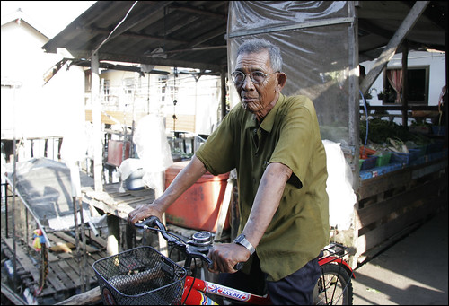 Man on bicycle at Koh Panyee