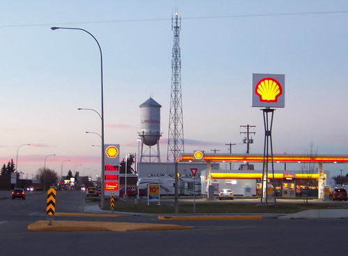 blue sunset red canada color colour building sign yellow evening watertower shell ab gasstation alberta 2010 canadagood thisdecade