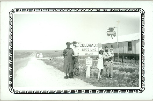 Group with Colorado sign