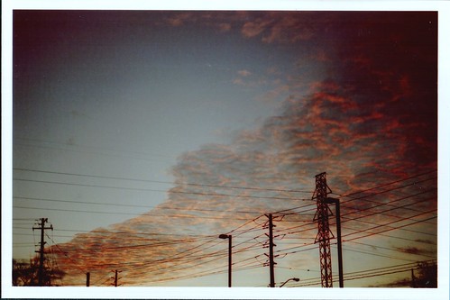 sunset sky film clouds falling cables poles analogue minoltaxg1 andoncemoretheworldcansleepsoundlyknowingthattheyaresafeonceagain