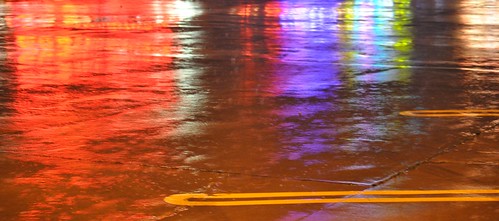 blue red color reflection green water rain yellow puddle rainbow texas purple tx lot rowlett paerking