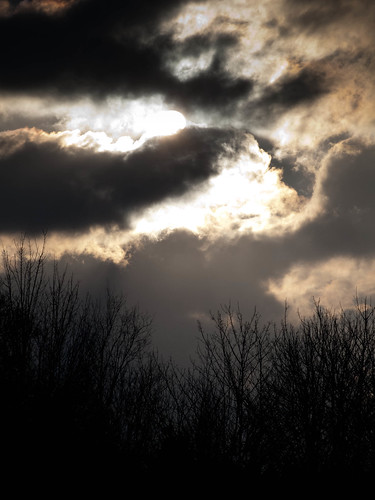 sun silhouette clouds