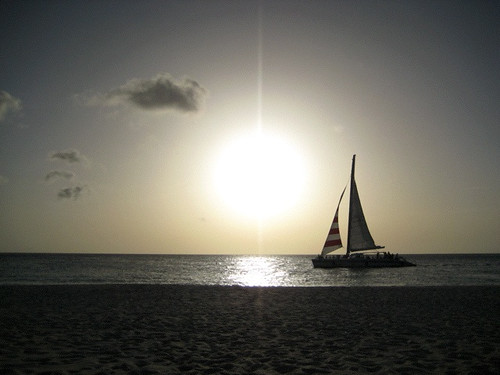 ocean sunset sailboat aruba