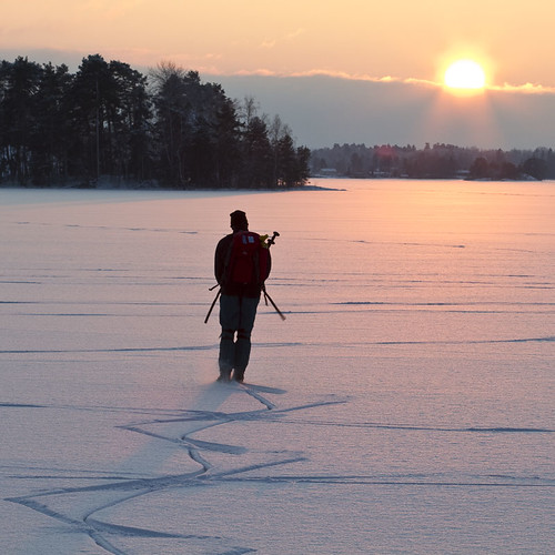 winter sunset lake snow man ice sport person frozen sweden skater sverige östergötland canonef100mmf28macrousm bjärkasäby rängen canoneos7d