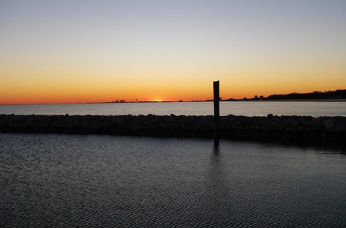 ocean sunset sea sky sun color reflection gulfofmexico water beautiful mississippi coast harbor sand rocks waves coastline ripples mississippigulfcoast gulfportms mississippisound