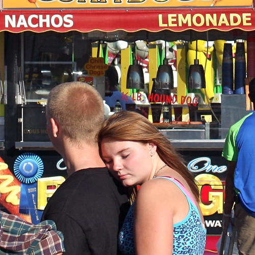 Couples at the fair: Nachos, lemonade, or love?