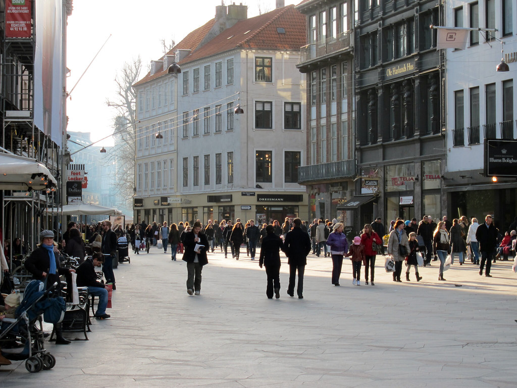 a crowd walking along the shopping street of strøget is one of the free things to do in copenhagen