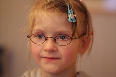 a girl in glasses