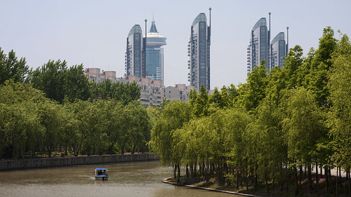 china park city travel trees windows sky people plants lake plant building tree window water glass skyscraper person photography boat asia shanghai chinese highrise prc 中国 上海 pudong peoplesrepublicofchina centurypark 世纪公园 浦东新区 浦东 pudongnewarea 中华人民共和国 canon40d pudongxinqu yingkebridge zhangjiariver