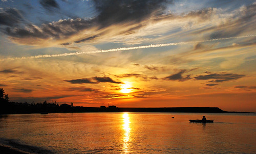 ocean sunset seascape canada reflection silhouette boat novascotia horizon shoreline canoe toneyriver saturatedcolor explored 18135mm nikond300s