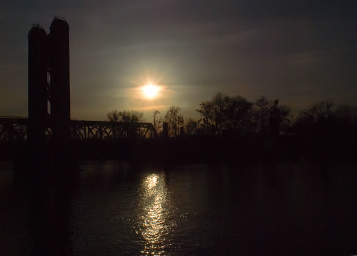 bridge sunset sun reflection tower water silhouette sarah clouds river dark glow sacramento robinson