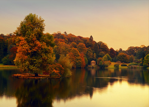 uk greatbritain bridge autumn sunset red england lake color colour fall water leaves yellow woodland garden temple golden evening leaf britain ducks olympus calm foliage grotto classical wiltshire apollo mere henryhoare