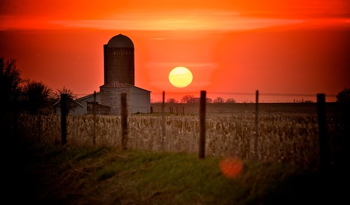 sunset red orange grass fence spring glow farm silo april cornstalks joemurphy josephlmurphy jmurphpix