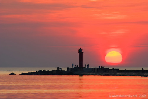 sunset sea sun lighthouse baltic latvia riga daugava