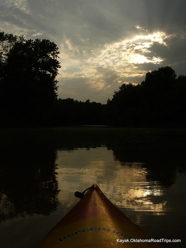 light sunset reflection oklahoma clouds golden kayaking paddling deepforkriver