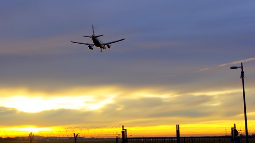 sunset yellow plane munich airport jet landing muc