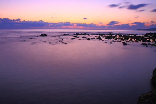 pink light sunset sea orange water rock clouds twilight rocks purple tones theunforgettablepictures platinumheartaward