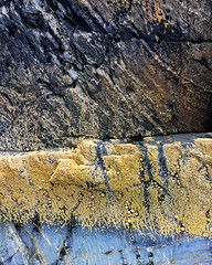 Rock Wall Abstract with Blue and Yellow