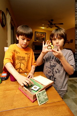 andrew showing nick his coin collection 