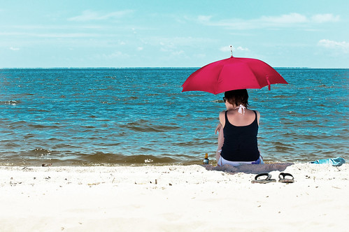 travel family blue light red sea sky woman usa sun white abandoned beach water sunglasses clouds digital america umbrella mississippi geotagged sand nikon shoes waves outdoor turquoise boring parasol wife biloxi bp distance attraction oilspill lightroom d300 christiansenger:year=2010 familygetty2010 gettyvacation2010 foursquare:venue=2132951