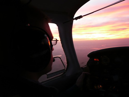sunset night airplane flying manitowoc