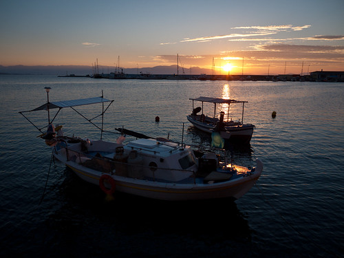 sunset boats dawn harbor greece gythio edelweissbiketravel tog1001