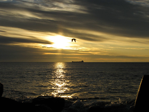 morning sun lake beach sunrise brighton ship superior duluth