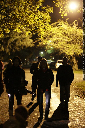 parent support team following trick or treaters in lake oswego