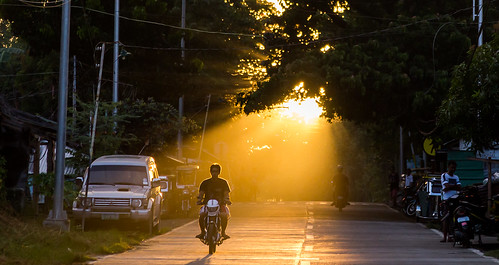 puertogalera philippines sun sunset motorcycle scooter road
