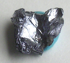 Class: Sulphides
System: Hexagonal
Hardness: 1-1.5
Specific gravity: 4.7
Luster: metallic
Color: bluish-gray
Cleavage: perfect clevage