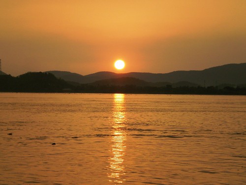 sunset by the brahmaputra