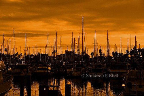 sunset beach water santabarbara port reflections boats harbor nikon waves pacific dusk silhouettes ripples yachts masts bluff kayaks d90