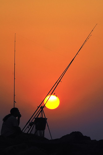 morning sea sun beach water silhouette sunrise dawn fishing fisherman rocks cyprus rods larnaca mediterranian