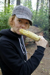 kat enjoying some fire cooked corn for lunch 