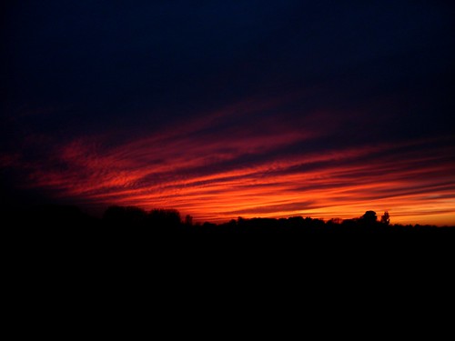 camera sunset red sky orange sun silhouette yellow clouds 14 cheap basic compact sam2011