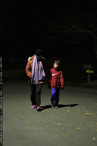mother and son walking home