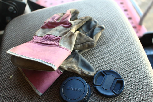 A bloggers necessities -- gloves and lens caps.
