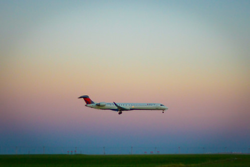 sunset airplane jet delta il landing bloomington cira