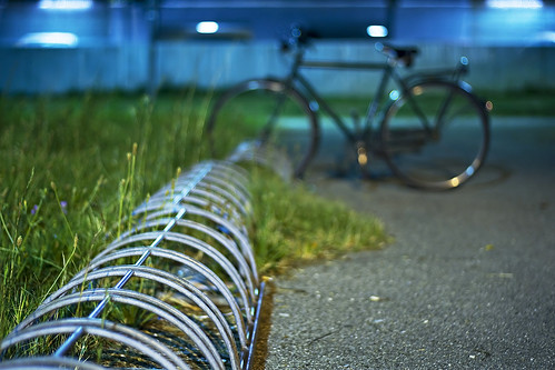 street old city blue grass night canon 50mm lights neon bokeh bikes 18