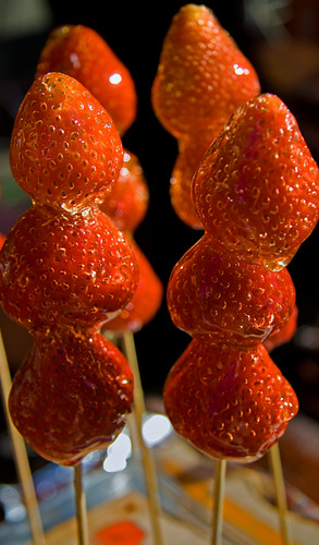 candied strawberries on a stick