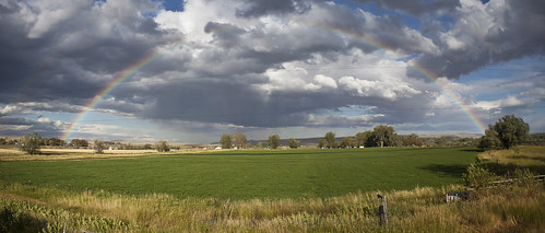 sky field grass rain clouds rainbow wyoming wy lander
