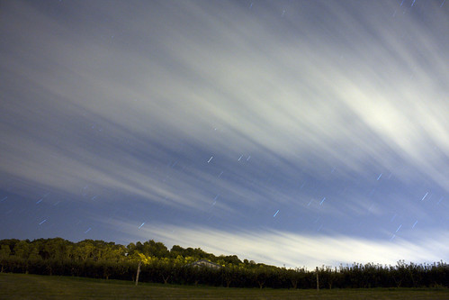 sky night clouds star time trails