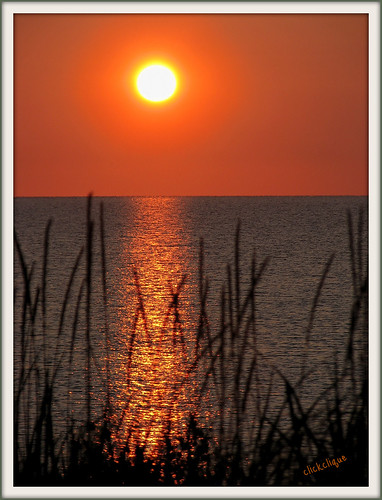 reflection beach water sunrise bay ngc grasses bestofflickr baiedeschaleurs bayofchaleur
