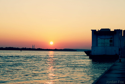 light sunset sun water river mississippi boat illinois alton