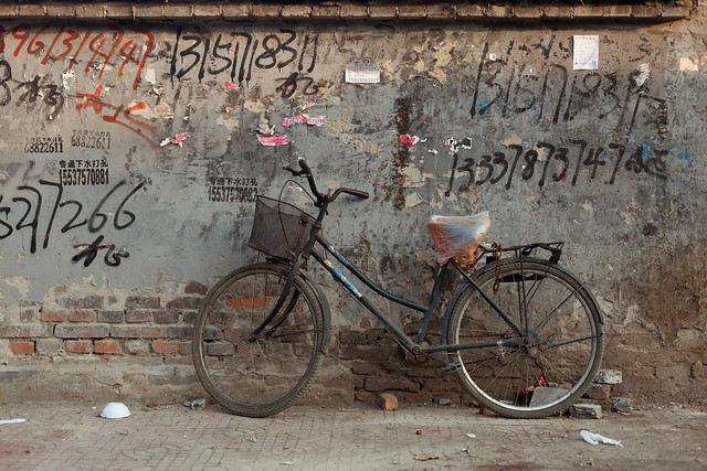 Bicycle and phone numbers, Pingguoyuan, Shijingshan district, Beijing, China - Sunday, 29th August 2010