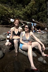 kat & rachel cooling their feet in the river 