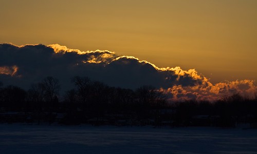 winter sky snow cold ice clouds sunrise golden michigan windy