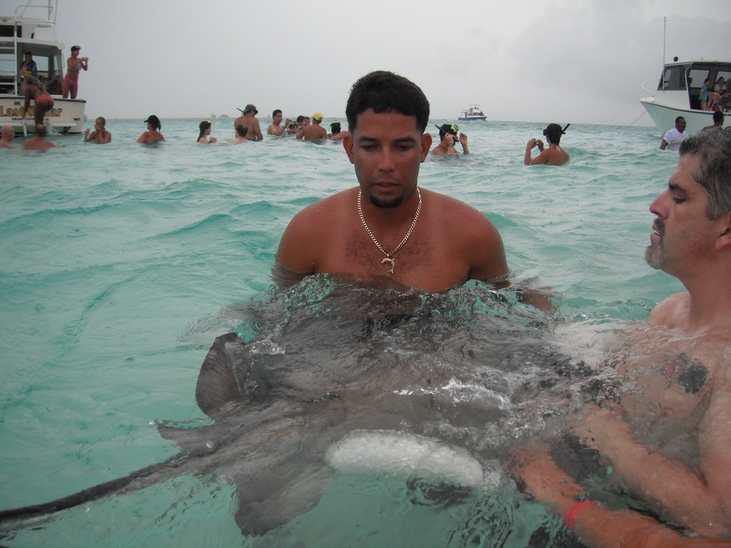 Our tour guide holding a stingray