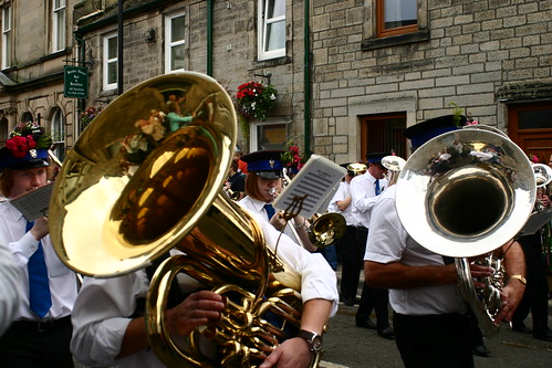 blue white building architecture silver scotland town village crowd band marchingband brass canoneos300d borders musicalinstruments dumfriesandgalloway commonriding hangingbaskets dumfriesshire langholm musicsheets townband langholmcommonriding toonband langholmcommonriding2010