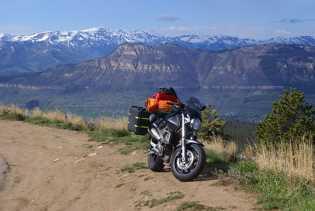 motorcycle parked on side of road with mountain views 167 Beartooth Highway